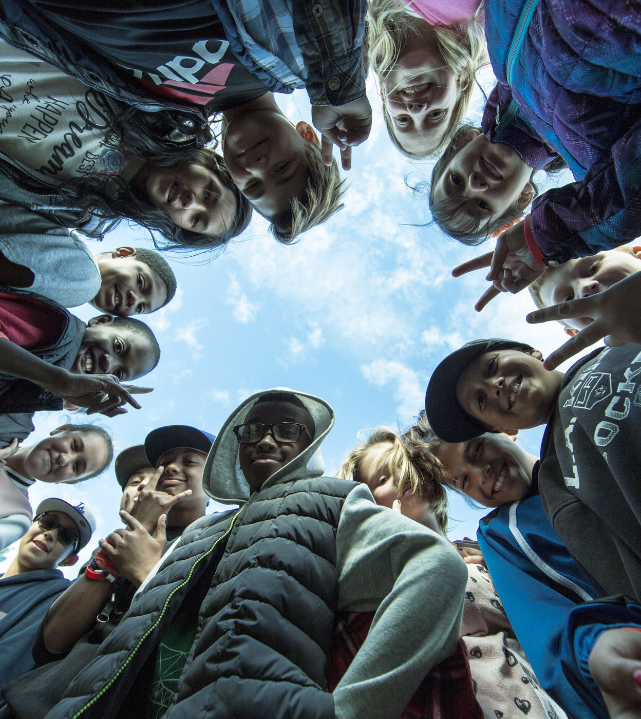Students in a team huddle